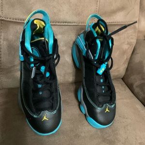 Youth Air Jordan’s black and aqua colored